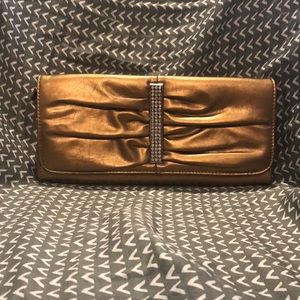 Bedazzled gold clutch. Magnetic close. (Like new)